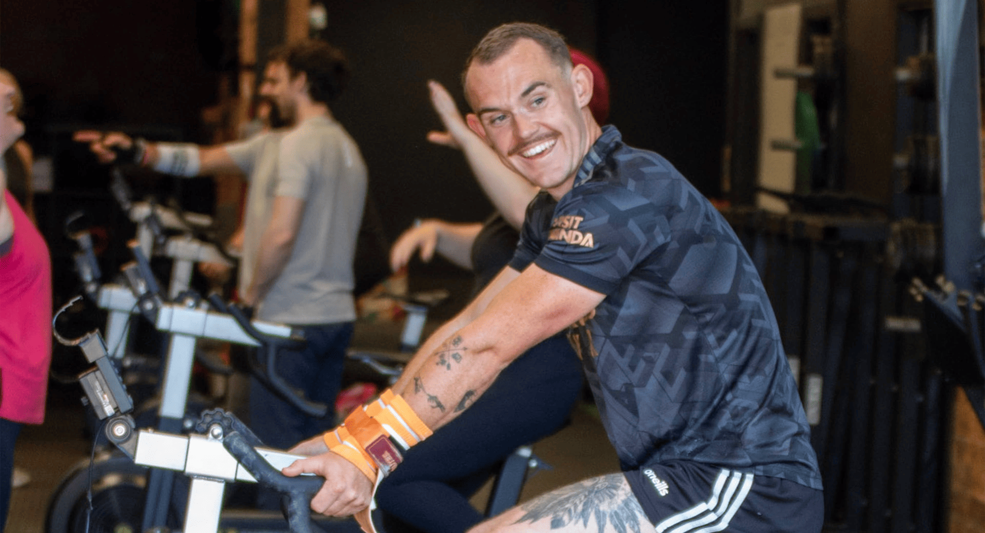 man doing cardio at BASEGYM